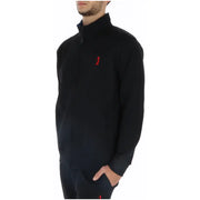 Black zip-up fleece jacket from U.S. Sweatshirts Collection with a small red embroidered logo on the left chest