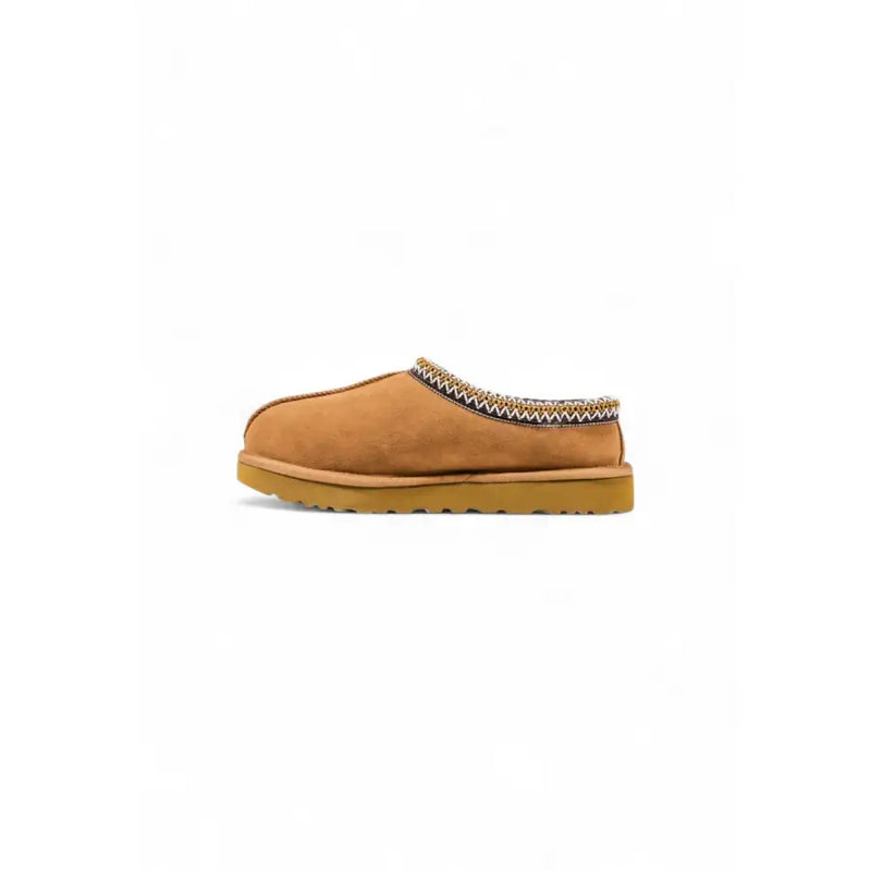 Tan suede UGG slip-on mule with zigzag trim in beige leather