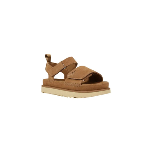 Sandales à plateforme Ugg pour femmes en daim beige avec brides en daim couleur camel, semelle épaisse en caoutchouc blanc cassé et deux fermetures réglables.