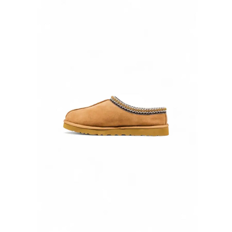 Ugg women beige suede round toe slippers with tan suede slip-on mule design and decorative woven trim for fall winter