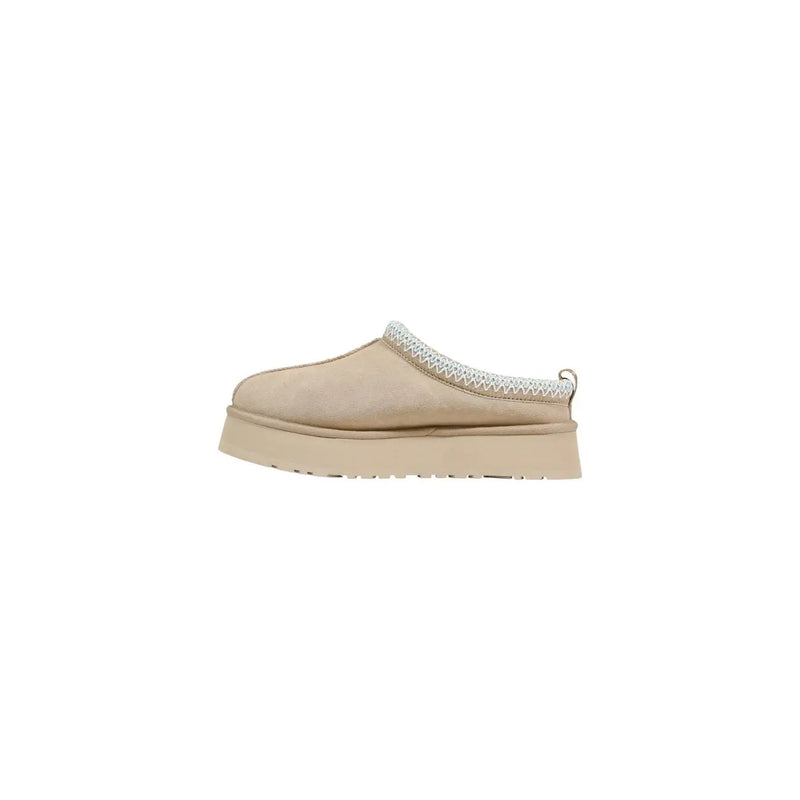 Beige suede slip-on mule with white woven trim and chunky platform sole from Ugg women leather platform slippers spring collection