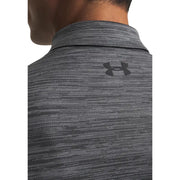 Under armour Polo homme en polyester gris foncé, orné d'un discret motif chiné et d'un logo sur la poitrine.