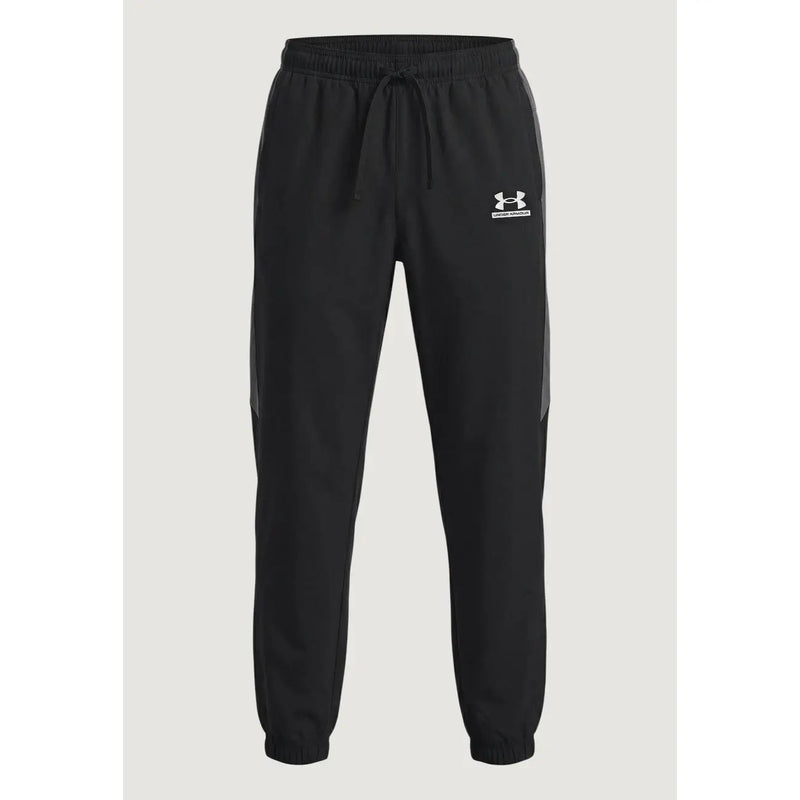 Under armour men trousers in black featuring gray side panels and a white logo on the left thigh for active wear