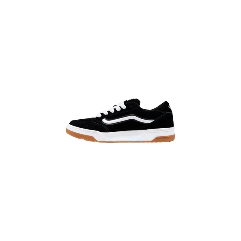 Black and white vans skate shoe with suede upper, rubber sole, classic low-top design.