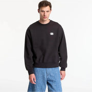 Sweat-shirt Vans pour homme en coton noir à col rond avec petit logo blanc sur la poitrine gauche, idéal pour un look décontracté.
