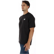 T-shirt Vans pour homme en coton noir à manches courtes, orné d'un petit logo blanc sur la poitrine gauche et d'un col rond.