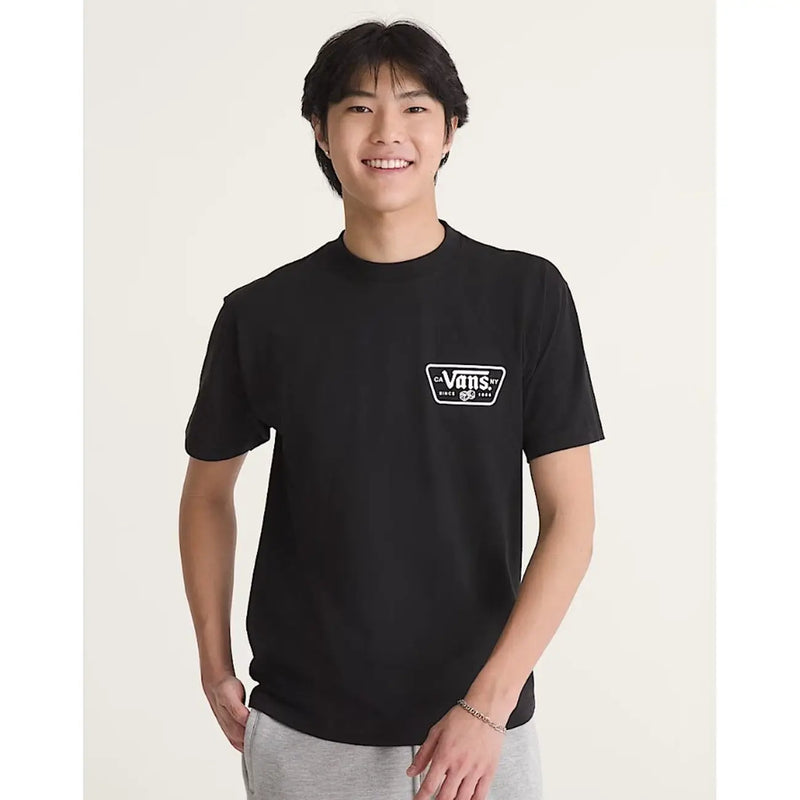 T-shirt Vans noir pour homme, en coton, manches courtes, col rond et logo blanc sur la poitrine gauche.