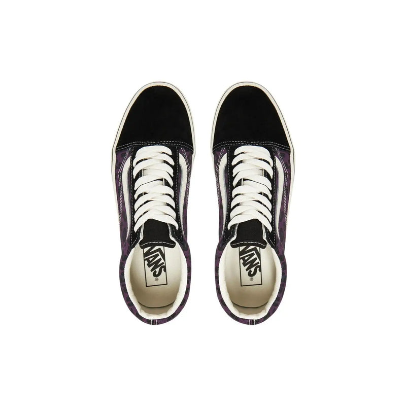 Baskets Vans Old Skool pour homme, en cuir noir et violet, avec lacets blancs et design classique en toile.