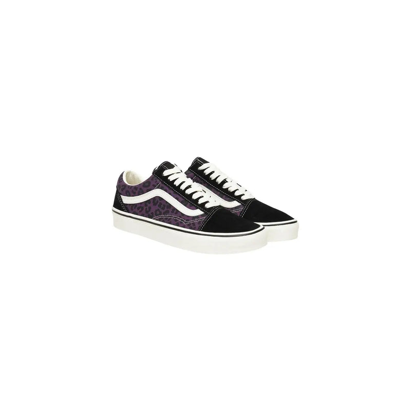 Baskets Vans Old Skool pour homme en cuir à imprimé léopard noir et violet, lacets blancs et semelle épaisse en caoutchouc blanc.