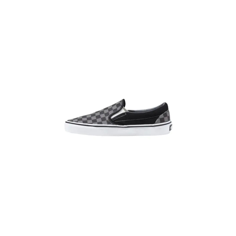 Baskets Vans pour homme, en tissu noir, à enfiler, avec motif à damier noir et gris et semelle en caoutchouc blanc.