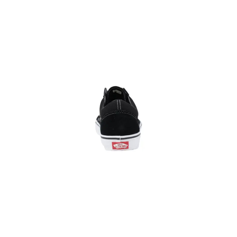 Baskets Vans Old Skool pour homme en daim noir, style skate, avec semelle en caoutchouc blanc et logo rouge au talon (vue de côté).