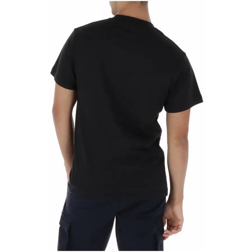 T-shirt Vans pour homme, noir, à manches courtes et col rond, en coton, avec un design classique à col rond.