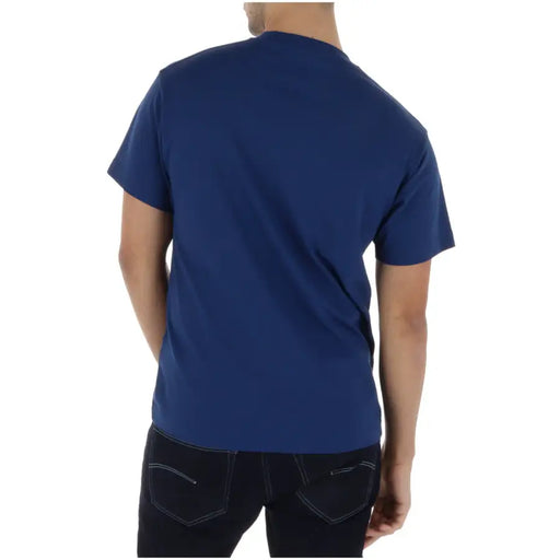 T-shirt Vans bleu marine à manches courtes et col rond pour homme, 100 % coton, idéal pour un style décontracté.