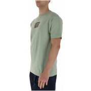 A light green Vans men t shirt with a black logo on the chest made of 100% cotton short sleeve round neck