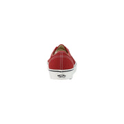 Baskets Vans rouges en toile pour homme, avec semelle en caoutchouc blanc et lacets à rayures noires.