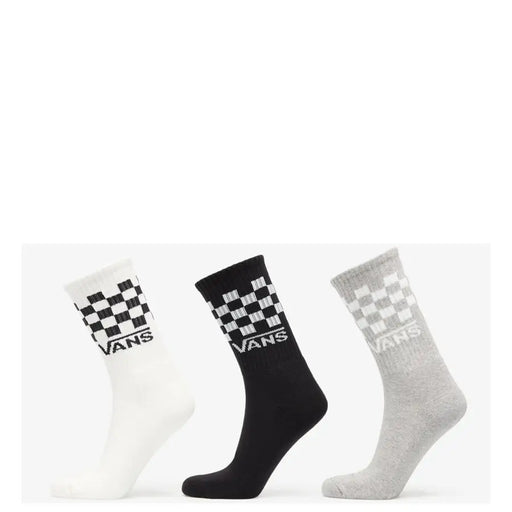 Trois paires de chaussettes Vans pour homme, blanches, noires et gris chiné, avec un motif à carreaux classique et le logo Vans.