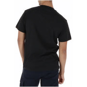 T-shirt Vans pour homme, noir, en coton, à manches courtes et col rond, avec motif graphique sur le devant.