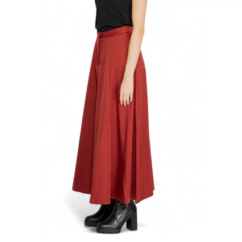 Vero Moda red polyester skirt for women with rust red satin finish and asymmetrical hemline for fall winter