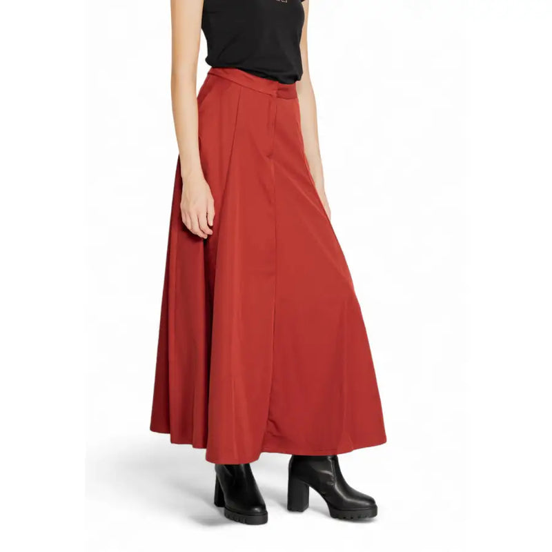 A flowing rust red polyester midi skirt with high waist and pleated front for women fall winter by vero moda