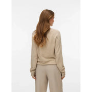 Vero Moda Pull beige à col rond pour femme, en maille douce et texturée, avec poignets côtelés.