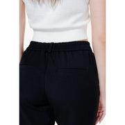Vero Moda Pantalon noir pour femme, taille élastique, coupe ajustée et élégante, poches avant discrètes.