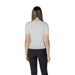 Back view of light gray ribbed top with black pants from Morgan De Toi collection