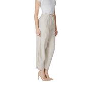 Beige high-waisted wide-leg trousers with subtle pleated front and side slit from vila clothes spring summer collection