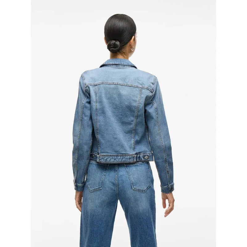 A medium-wash denim jacket with classic collar and buttoned cuffs in vila women light blue cotton blend blazer long fit style