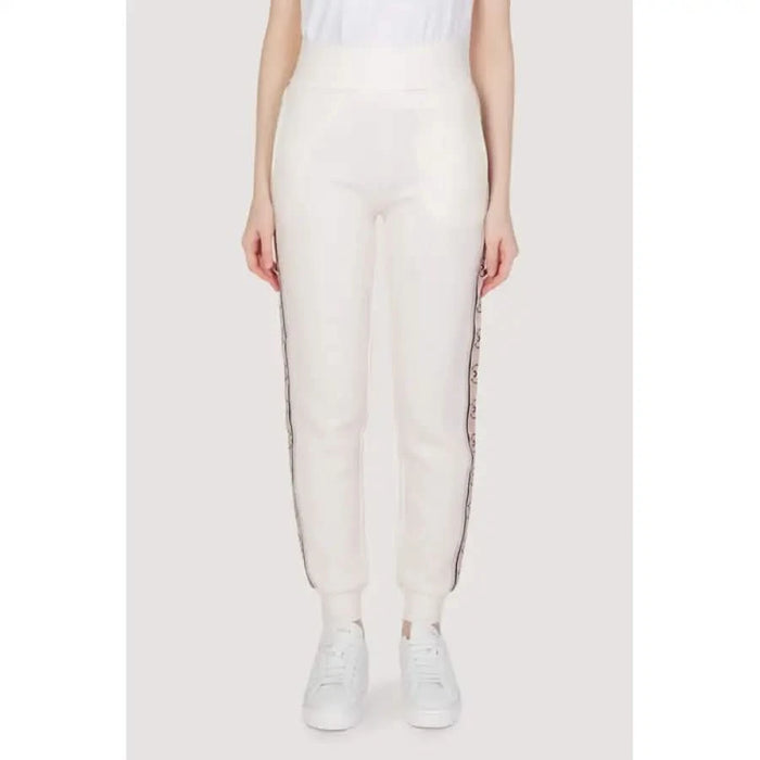 White Guess Active Women’s Cotton Trousers featuring decorative side stripe detail