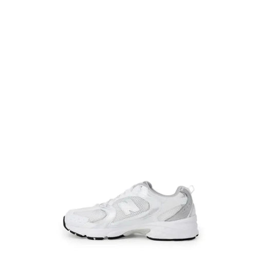 White athletic shoe featuring New Balance Women’s Grey Sneakers in Faux Leather design