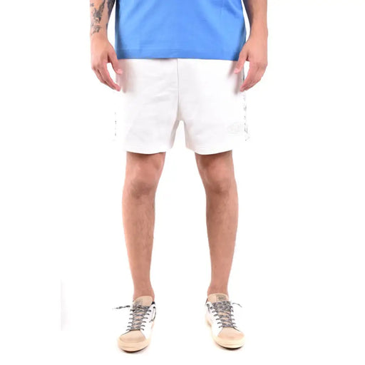 Comfortable white athletic shorts with patterned zigzag side stripes for active wear