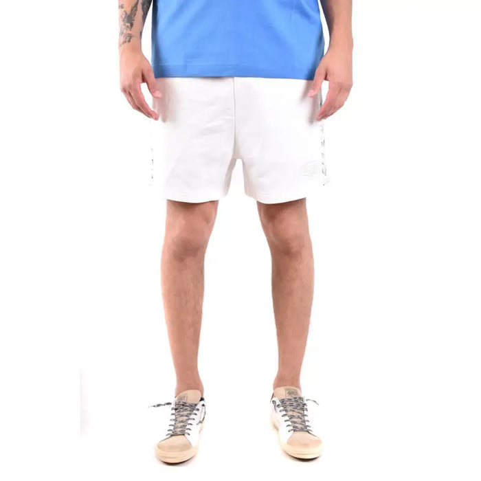 Comfortable white athletic shorts with patterned zigzag side stripes for active wear