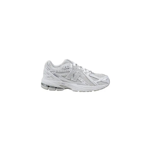 White New Balance sneaker displayed, emphasizing stylish and comfortable footwear