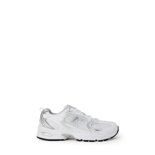 White New Balance sneaker featured in New Balance Women’s Grey Sneakers in Faux Leather
