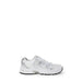 White New Balance sneaker featured in New Balance Women’s Grey Sneakers in Faux Leather