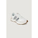 White New Balance WS327PJ women’s lace-up sneakers with black and white leopard print design