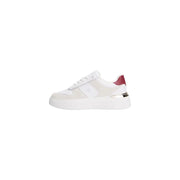 White and beige leather Tommy Hilfiger women’s sneakers with red heel accent and silver details