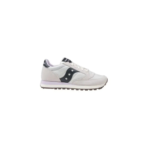 White and black Saucony sneaker displayed as part of the product collection