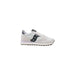 White and black Saucony sneaker displayed as part of the product collection
