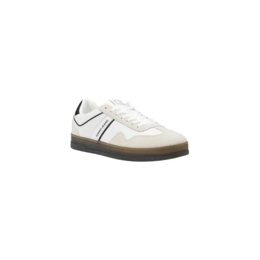 White and black Tommy Jeans sneaker with gray accents displayed in product image