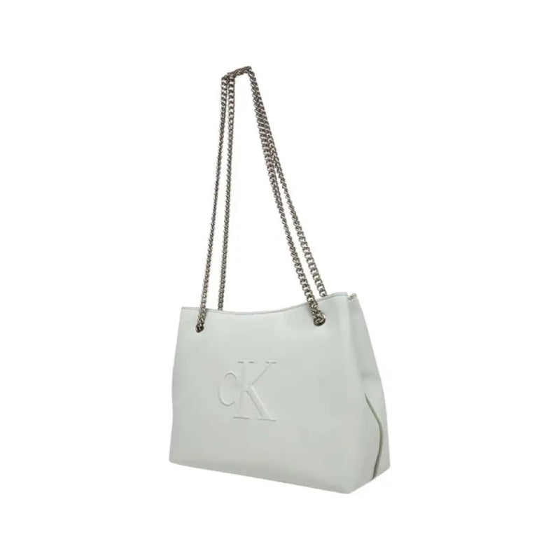 White Calvin Klein chain strap tote bag displayed in a product image
