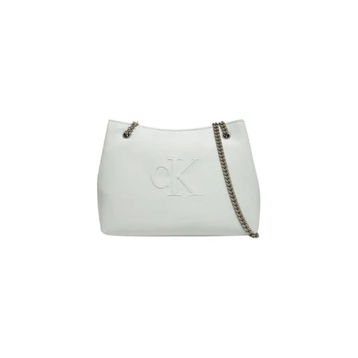 White Calvin Klein chain strap tote bag displayed with elegant design and luxurious aesthetic