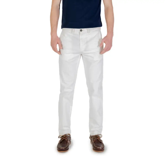 White chino pants displayed with Men’s Tan Casual Pants and Brown Boat Shoes