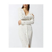 A white cotton knit dress by Pinko with a deep v neckline and front button closure