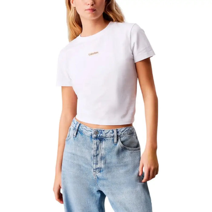 White crop top paired with blue jeans from Womens Beige T Shirt and White Denim Shorts collection