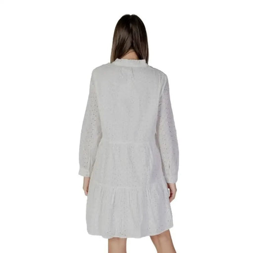 White eyelet long-sleeved dress by B.young showcasing a v-neck design in cotton