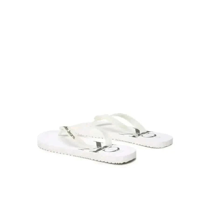 White flip-flop sandals featuring Calvin Klein logo from Calvin Klein Jeans Men Slippers