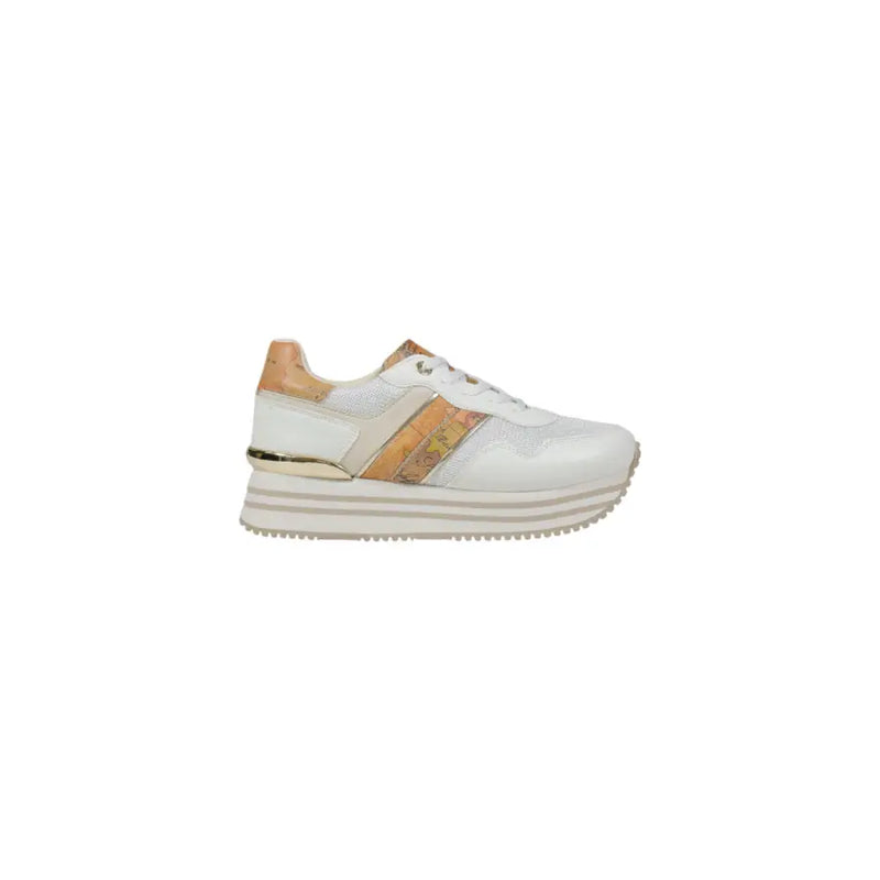 White and gold platform sneaker with tan accents and a textured map-patterned stripe on the side