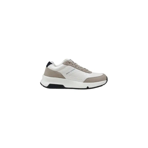 White and gray sneaker showcasing modern athletic footwear design