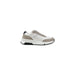 White and gray sneaker showcasing modern athletic footwear design
